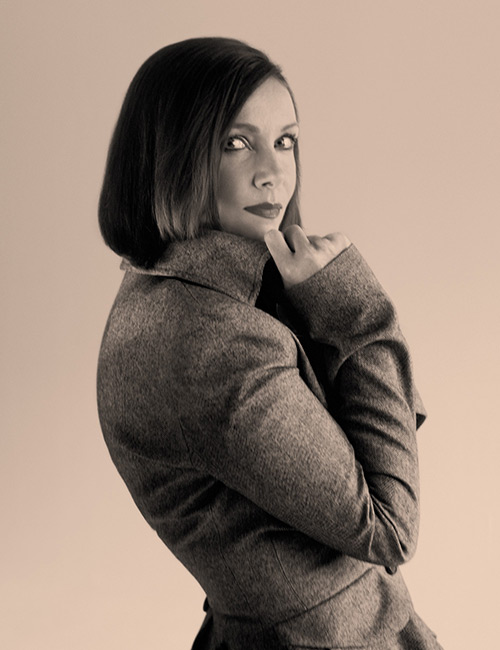 Cathy wears a mohair wool coat by CHRISTIAN DIOR.