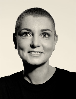Sinéad is wearing a black silk T-shirt by MAISON MARTIN MARGIELA, available at Selfridges, London.